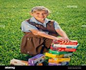 smiling young girl selling girl scout cookies usa 2g3cdm9.jpg from young scout selling cookies
