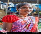 close u p portrait of indian female market trader wearing red sari udupi karnataka india 2g4wtwb.jpg from karnataka village and auntye