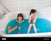 from above of adorable little brother and sister bathing in bathtub with blue water and having fun together 2g8m0be.jpg from brother bathing sist
