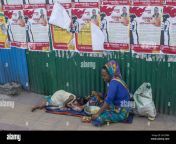 a homeless bangladeshi mother having her launch on the footpath while her daughter is sleeping beside on october 30 2020 in dhaka bangladesh photo by khandaker azizur rahman sumonnurphoto 2kc308a.jpg from bangladeshi dad fuck sleeping daughter 3gp sexwap bollywo