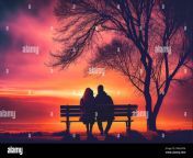 romantic couple sits on a park bench embracing and enjoying the stunning sunset together this heartwarming scene captures the beauty of love and con 2m6347m.jpg from bangladeshi lover romaance in park mp4