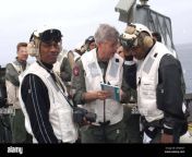 us navy commander 3rd fleet vice adm michael j mccabe explains to actor comedian jamie foxx about the landing signal officer lso guidebook 2r4a3ct.jpg from lso 027