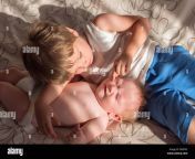 brother and sister playing together four years old boy plays with his little sister newborn baby lying on sofa with elder brother kids in bed brot ragfxc.jpg from မြန်မာချောင်းရိုက်အတွဲan elder sister with small brot