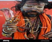 hindu ascetic sadhu belonging to the aghori sect india he is holding monkey bones t5bh6x.jpg from indian sect