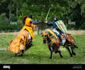 mounted knights in medieval armour fighting on horseback during jousting demonstration w5am9b.jpg from mounted fight