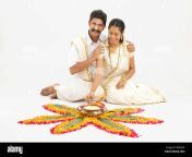 south indian couple making rangoli w9k5en.jpg from south indian couple making love