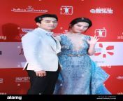 chinese actress liu yifei right and south korean actor song seung heon pose on the red carpet of the internet movie night event during the 18th sh w8e6b4.jpg from china xxx movie song