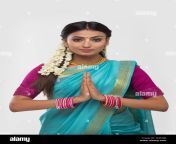 south indian woman greeting and looking at the camera waegjb.jpg from south india lady