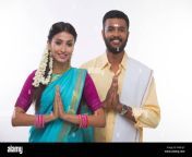 south indian couple greeting and smiling at the camera waegjy.jpg from south indian husband and wife from indian husband and wife in hotel