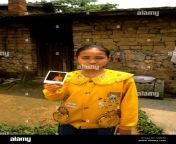 young chinese girl in small village with polaroid in yangshou china acjwf8.jpg from chines small and yong