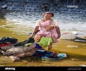 woman washing clothes in a river madurai tamil nadu india ay4tdg.jpg from tamil aunty washing clothes in riverside hot sexy video