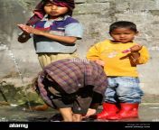 three small indian children boy and girls doing laundry in public a1ea1h.jpg from indian sexy kid