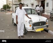 indian man standing proudly alongside his ambassador car in pondicherry b5t5j9.jpg from indian in car