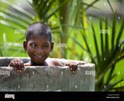 indian boy playing in a rural concrete washing tub india b47njg.jpg from indian plays in the tub mp4