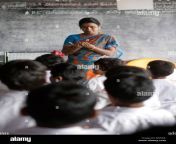teacher and pupils in a classroom in a school in tamil nadu india bg53jc.jpg from tamil sechool teacher se