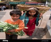 nepali brother and sister carrying produce to market in darjeeling b18jen.jpg from nepali sister br