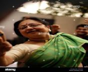 mature indian woman enjoying a dance c56h55.jpg from indian aunty saree and worker