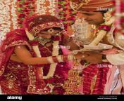 newly wed indian couple at their wedding ceremony d5r56r.jpg from indian newly weds