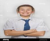 young girl smiling looking at the camera in school blouse with school d9e32y.jpg from school garl 10
