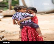 smiling happy rural indian village girl carrying her brother andhra ddjte8.jpg from www india sister in brother