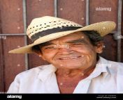 happy smiling head and shoulders portrait of a cuban man age aged dn9b5r.jpg from oldage in america with 60 oldman