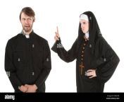 a young catholic priest and nun bursting in laughter d00cwr.jpg from father nun crunch