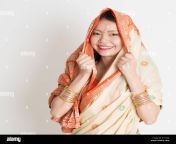 portrait of indian muslim girl in sari covered her head smiling confidently e77yw2.jpg from young women and xxxarab muslim sex video coml village sex image
