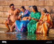 hindu pilgrims bathing in the holy river ganges varanasi uttar pradesh eb1pj0.jpg from indian aunty bathroom