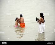 woman with daughter bathing in hooghly river kolkata west bengal india et1e18.jpg from indian desi vill puja bath in room