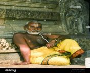 a hindu priest with vishna symbol on his forehead sits with a yellow fgkp0a.jpg from indian older man lungi nude penisx kannada