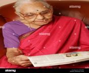 a 92 year old maharashtrian woman reading a marathi book india mr686j f3gp6f.jpg from mharstra old new anty