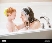 mother and son 2 3 having bubble bath g2adtb.jpg from mom and son on bath