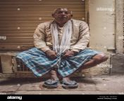 varanasi india 20 february 2015 indian man sitting next to closed h03464.jpg from indian old man lungi andgabriella nu