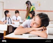 1 indian girl high school student sleeping in classroom k6p2jg.jpg from inadian clg sleeping with custmers ajay xxx sxs videos