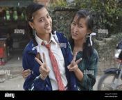 two nepalese teenagers with bows in hair that pose for the picture kgggd3.jpg from nepali indian college gir