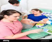 pregnant woman in labor room with doctor and nurse kng15h.jpg from doctor opan sex nurse preganent pesan