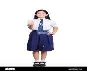 1 indian young girl school student showing thumbsup success education kx38cn.jpg from small school and indian young l