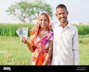 2 indian rural farmer couple showing rupees notes farm village kxdcb4.jpg from indian village couble