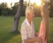 videoblocks grandfather and granddaughter outdoors grandpa comforting little girl and talking to her in park taking care of grandchilds bdfxa o1x thumbnail 1080 01.png from small seduce domine grandpa