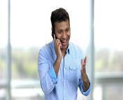 videoblocks young happy excited indian mans talking on phone brown skinned hindu guy having expressive emotional conversation in a bright room hwlw8ncui thumbnail 1080 01.png from hindi talking