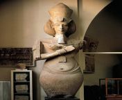 colossal statue of akhenaten.jpg from egypt cairo egyptian museum colossal statue of senusret iii found in karnak temple he is represented walking and wears a loin cloth the pschent 2cap7w5 jpg