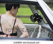 woman snapping bra inside car stock imagebn349003.jpg from bra snapping